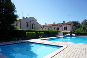 Cosy two - storey villa with a garden and a shared swimming pool, Porto Santa Margherita